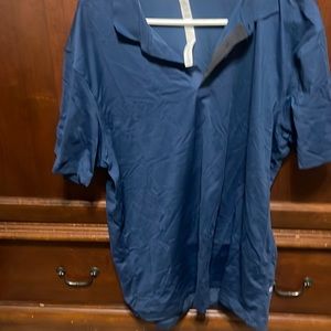 Lululemon Polo shirt on navy blue. Size XL worn once.